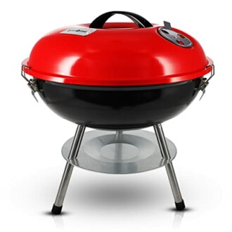 Red and black portable charcoal grill with lid and stand