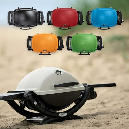 Various colored portable grills on a beach.