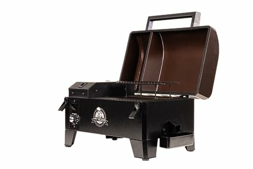 Portable tabletop grill with open lid and handle