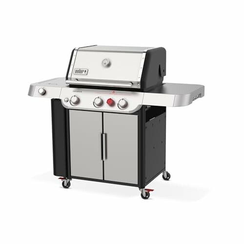 Stainless steel gas grill with side shelves and storage cabinet.