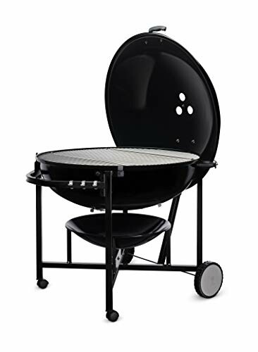 Charcoal grill with open lid and wheels