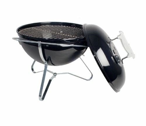 Portable charcoal grill with open lid