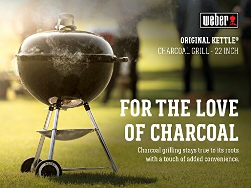 Weber Original Kettle charcoal grill on a lawn